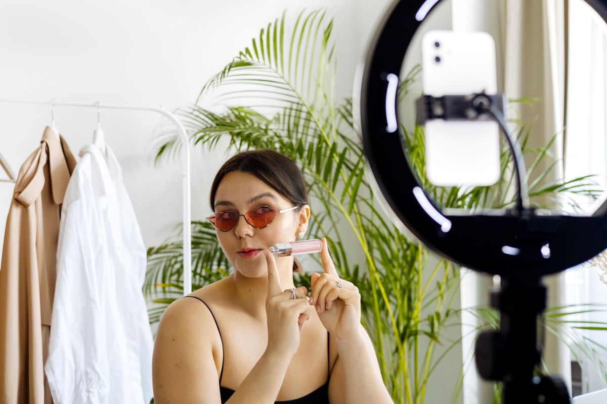 influencer shooting a makeup product promotion video